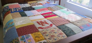 Finished quilt on bed