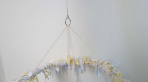Twine attached to ring for hanging