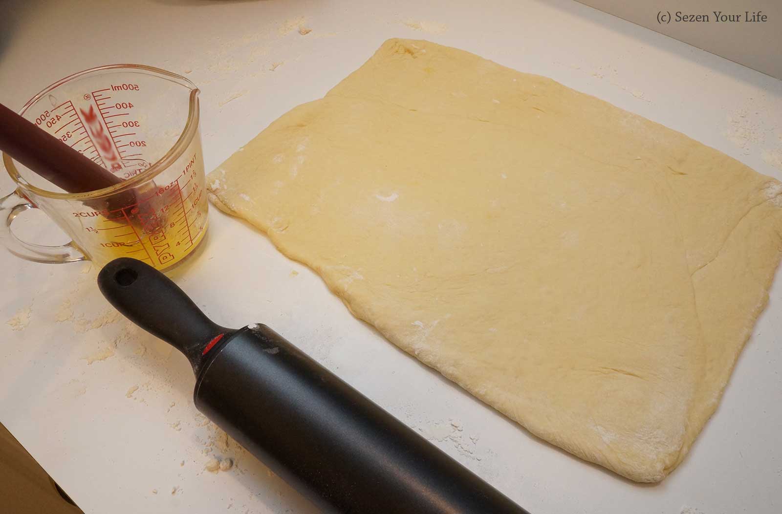 Cinnamon Roll brushing with Melted Butter by Sarah Franzen